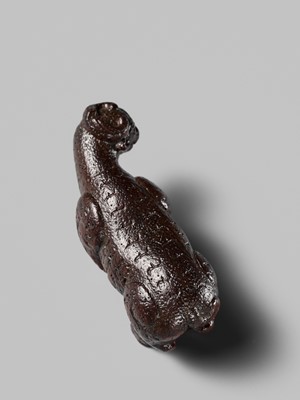 Lot 285 - OUCHI SOSUI: A FINE SO SCHOOL WOOD NETSUKE OF AN ARCHAIC CHINESE BRONZE BUFFALO