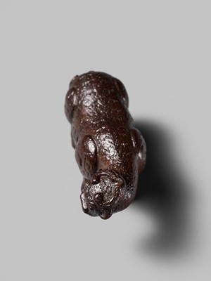 Lot 285 - OUCHI SOSUI: A FINE SO SCHOOL WOOD NETSUKE OF AN ARCHAIC CHINESE BRONZE BUFFALO