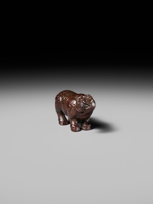 Lot 285 - OUCHI SOSUI: A FINE SO SCHOOL WOOD NETSUKE OF AN ARCHAIC CHINESE BRONZE BUFFALO