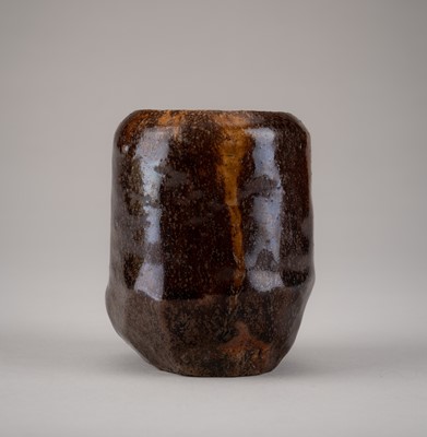 Lot 165 - AN IRREGULAR SETO WARE BROWN-GLAZED CHAIRE (TEA CADDY)