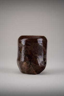 Lot 165 - AN IRREGULAR SETO WARE BROWN-GLAZED CHAIRE (TEA CADDY)