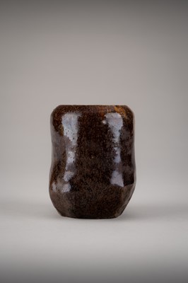 Lot 165 - AN IRREGULAR SETO WARE BROWN-GLAZED CHAIRE (TEA CADDY)