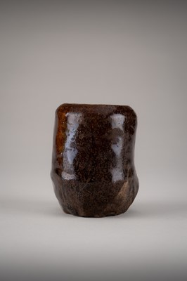 Lot 165 - AN IRREGULAR SETO WARE BROWN-GLAZED CHAIRE (TEA CADDY)