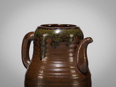 Lot 180 - A TAKATORI TEADUST-SPLASHED BROWN-GLAZED TEAPOT-FORM CHAIRE (TEA CADDY)