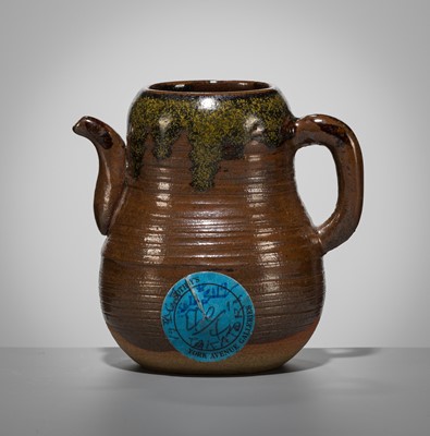 Lot 180 - A TAKATORI TEADUST-SPLASHED BROWN-GLAZED TEAPOT-FORM CHAIRE (TEA CADDY)