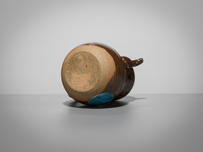 Lot 180 - A TAKATORI TEADUST-SPLASHED BROWN-GLAZED TEAPOT-FORM CHAIRE (TEA CADDY)