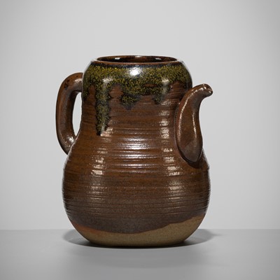 Lot 188 - A TAKATORI TEADUST-SPLASHED BROWN-GLAZED TEAPOT-FORM CHAIRE (TEA CADDY)