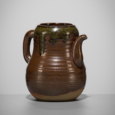 Lot 180 - A TAKATORI TEADUST-SPLASHED BROWN-GLAZED TEAPOT-FORM CHAIRE (TEA CADDY)