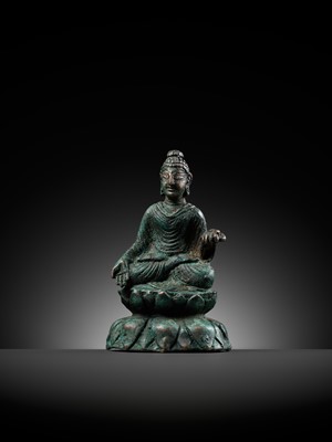 Lot 173 - A SILVER-INLAID BRONZE FIGURE OF BUDDHA SHAKYAMUNI, SWAT VALLEY, 7TH CENTURY