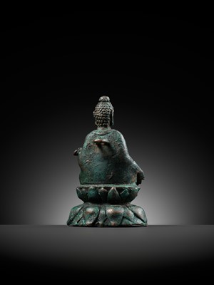Lot 173 - A SILVER-INLAID BRONZE FIGURE OF BUDDHA SHAKYAMUNI, SWAT VALLEY, 7TH CENTURY