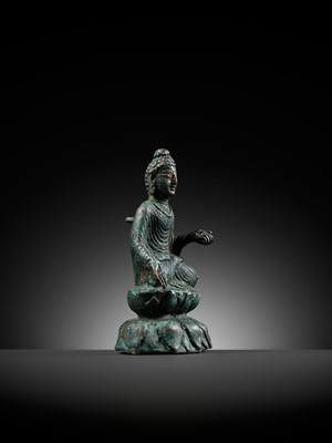 Lot 173 - A SILVER-INLAID BRONZE FIGURE OF BUDDHA SHAKYAMUNI, SWAT VALLEY, 7TH CENTURY