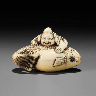 Lot 432 - OKAKOTO: AN IVORY NETSUKE OF EBISU ON A BLOWFISH (FUGU)