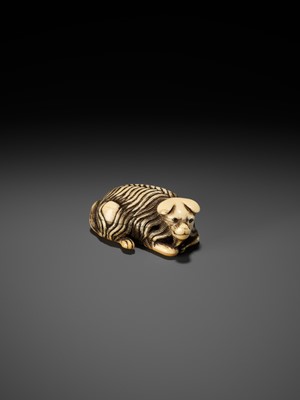 Lot 56 - A RARE IVORY NETSUKE OF A JAKONEKO (MUSK CAT)