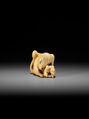 Lot 60 - A RARE IVORY NETSUKE OF A KITSUNE (FOX) AND CUB