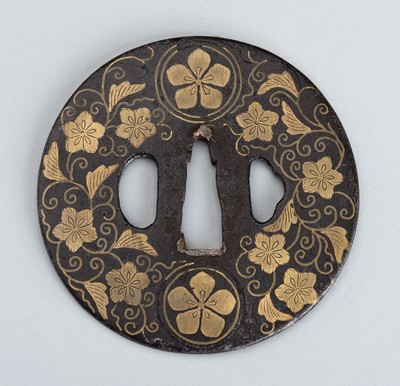 Lot 190 - AN IRON TSUBA WITH SAKURA MON AND CHERRY BLOSSOMS