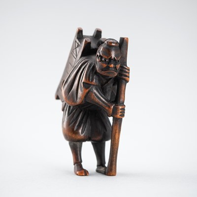 Lot 501 - A WOOD NETSUKE OF A MOUNTAIN MONK