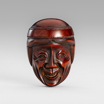 Lot 1801 - HOSHUNSAI MASAYUKI: A WOOD MASK NETSUKE OF UBA
