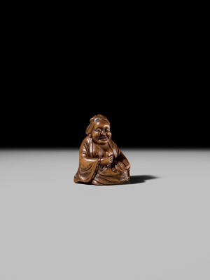 Lot 409 - ONO SHORAKU: A WOOD SHUNGA NETSUKE OF OKAME AND TENGU MASK