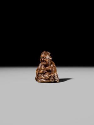 Lot 409 - ONO SHORAKU: A WOOD SHUNGA NETSUKE OF OKAME AND TENGU MASK