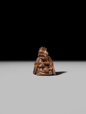 Lot 409 - ONO SHORAKU: A WOOD SHUNGA NETSUKE OF OKAME AND TENGU MASK
