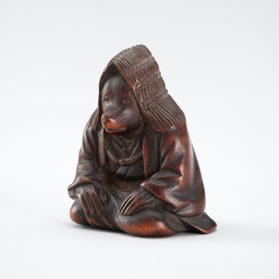 Lot 504 - A WOOD NETSUKE OF A FOX PRIEST (HAKUZOSU)