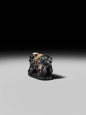 Lot 263 - SHIBAYAMA: A FINE INLAID EBONY WOOD NETSUKE OF A CAPARISONED SHISHI