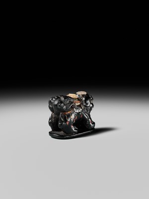 Lot 263 - SHIBAYAMA: A FINE INLAID EBONY WOOD NETSUKE OF A CAPARISONED SHISHI