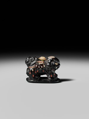 Lot 263 - SHIBAYAMA: A FINE INLAID EBONY WOOD NETSUKE OF A CAPARISONED SHISHI