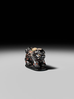 Lot 263 - SHIBAYAMA: A FINE INLAID EBONY WOOD NETSUKE OF A CAPARISONED SHISHI