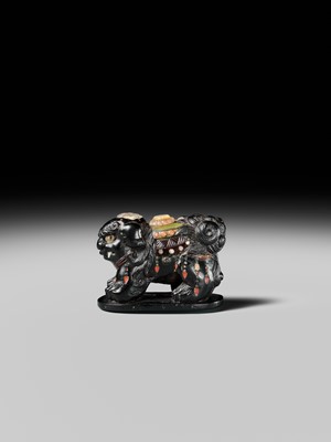 Lot 263 - SHIBAYAMA: A FINE INLAID EBONY WOOD NETSUKE OF A CAPARISONED SHISHI
