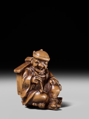 Lot 231 - AN AMUSING WOOD KARAKURI (TRICK) NETSUKE OF A MASK SELLER