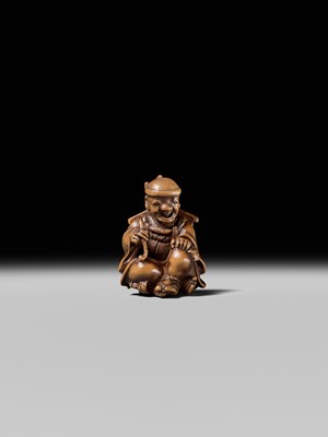 Lot 231 - AN AMUSING WOOD KARAKURI (TRICK) NETSUKE OF A MASK SELLER