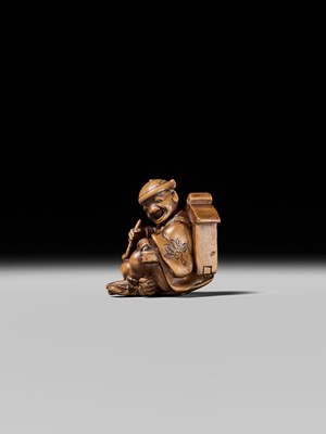 Lot 231 - AN AMUSING WOOD KARAKURI (TRICK) NETSUKE OF A MASK SELLER