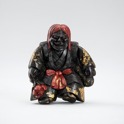 Lot 668 - A FINE LACQUERED PRESSED HORN NETSUKE OF SHOJO