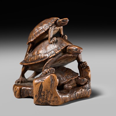 Lot 449 - A WOOD OKIMONO NETSUKE OF A TURTLES ON A ROOF TILE, ATTRIBUTED TO TADAKAZU