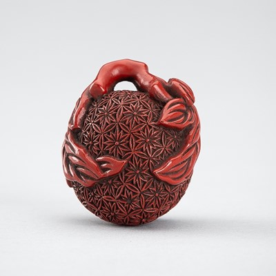 Lot 664 - A FINE TSUISHU (CARVED RED LACQUER) NETSUKE OF A PEACH