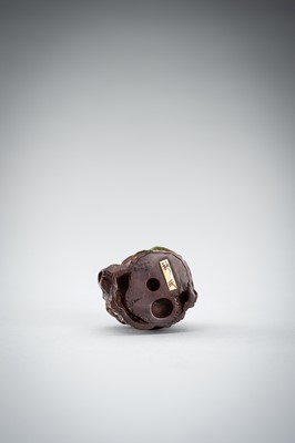 Lot 523 - RYUMIN: A WOOD NETSUKE OF HANASAKA-JIJI WITH A BASKET OF ASHES