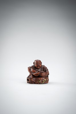 Lot 523 - RYUMIN: A WOOD NETSUKE OF HANASAKA-JIJI WITH A BASKET OF ASHES