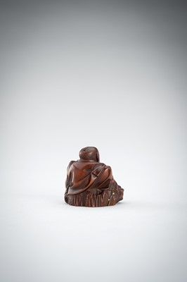 Lot 523 - RYUMIN: A WOOD NETSUKE OF HANASAKA-JIJI WITH A BASKET OF ASHES