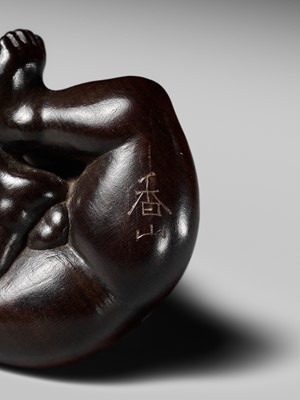 Lot 233 - KOZAN: A FINE WOOD NETSUKE OF KINTARO