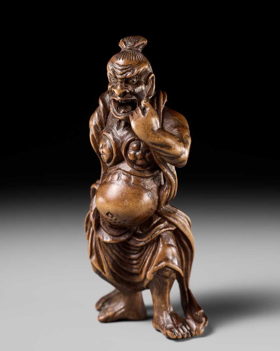 Lot 205 - A FINE EDO SCHOOL WOOD NETSUKE OF A NIO GUARDIAN