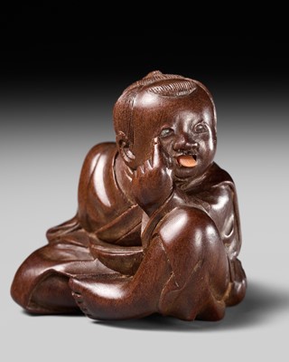 Lot 217 - AN INLAID WOOD NETSUKE OF A BOY WITH OKAME MASK, ATTRIBUTED TO MIWA