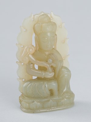 A PALE CELADON JADE FIGURE OF GUANYIN