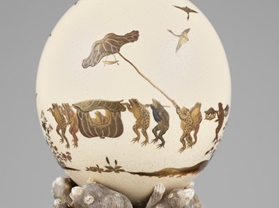 Lot 129 - A RARE LACQUERED OSTRICH EGG DEPICTING A PROCESSION OF FROGS
