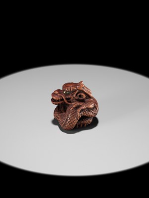 Lot 90 - MINKO: A POWERFUL WOOD NETSUKE OF A COILED DRAGON