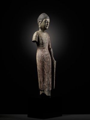 Lot 53 - A RARE AND IMPORTANT POLYCHROME DECORATED LIMESTONE FIGURE OF BUDDHA, NORTHERN QI DYNASTY