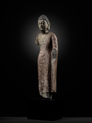 Lot 53 - A RARE AND IMPORTANT POLYCHROME DECORATED LIMESTONE FIGURE OF BUDDHA, NORTHERN QI DYNASTY