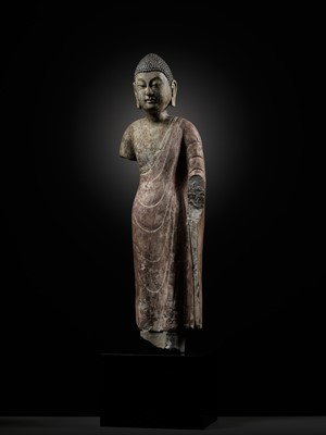 Lot 53 - A RARE AND IMPORTANT POLYCHROME DECORATED LIMESTONE FIGURE OF BUDDHA, NORTHERN QI DYNASTY