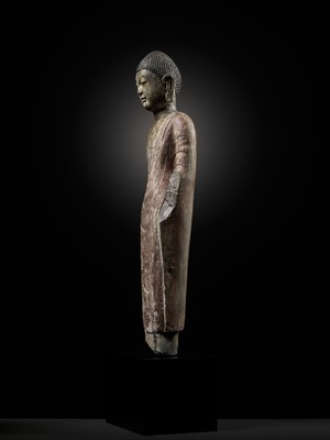 Lot 53 - A RARE AND IMPORTANT POLYCHROME DECORATED LIMESTONE FIGURE OF BUDDHA, NORTHERN QI DYNASTY