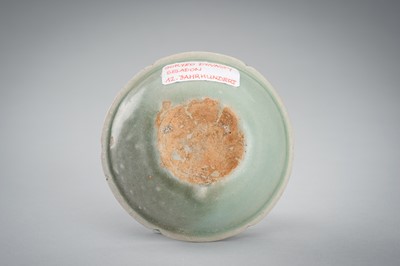 Lot 950 - THREE SMALL CELADON GLAZED AND MOLDED PORCELAIN DISHES, 12TH CENTURY